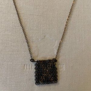 Silver Necklace with "X" in hanging chain